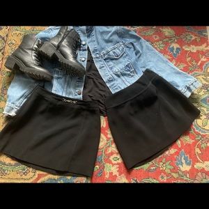 TWO vintage black mini skirts